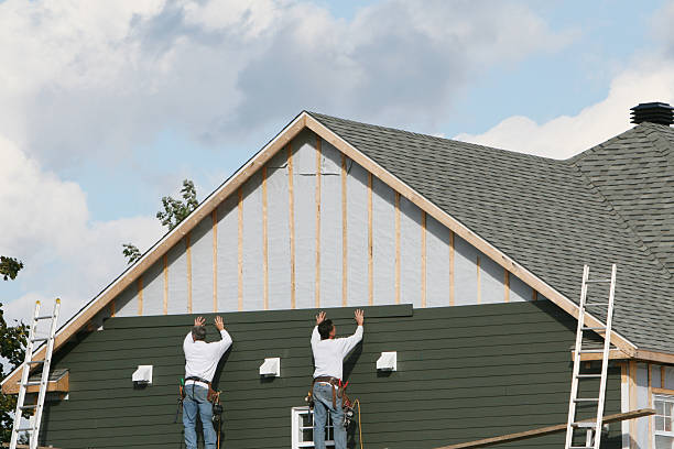 Professional Siding Installation technician working in Port Orange, FL